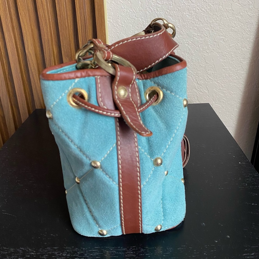 Claudia Firenze Quilted Drawstring
Nubuck Leather Handbag Studded
Bucket Bag - Picture 6 of 16